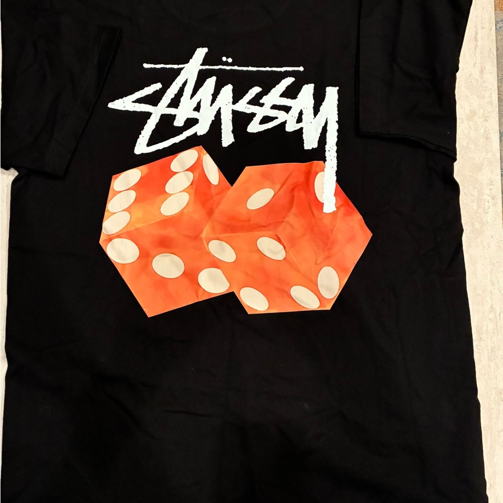 Stussy Black and Orange Graphic Tee